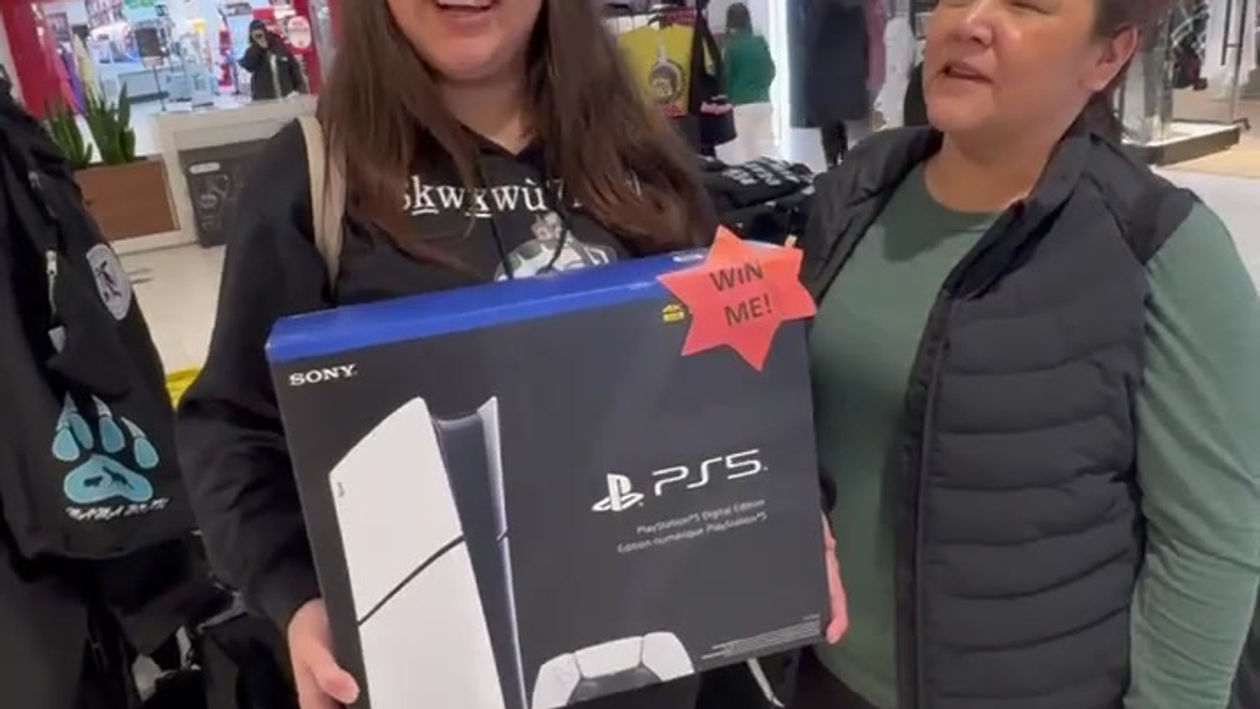 Another PlayStation 5 winner. She won by purchasing a few tees and a pendant. Very cool